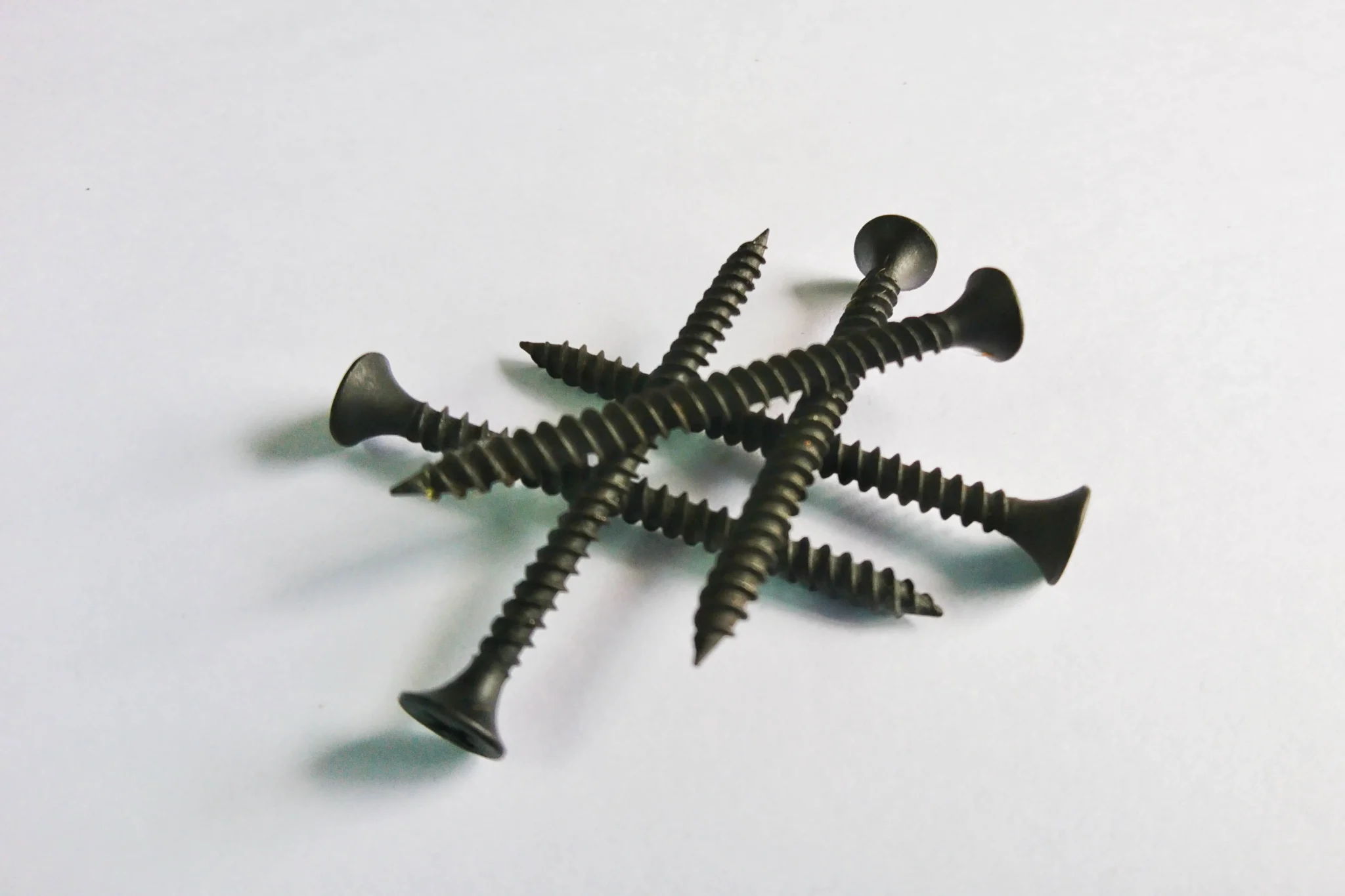 close up screws white background 2048x1365 1